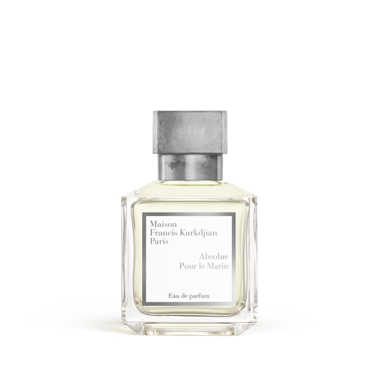Clear glass rectangular perfume bottle with light yellow liquid and a grey metallic cap, featuring a white label.