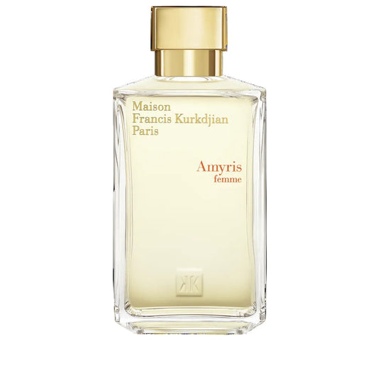 Clear glass perfume bottle with a light yellow liquid and a matte gold-toned rectangular cap, featuring brand text.