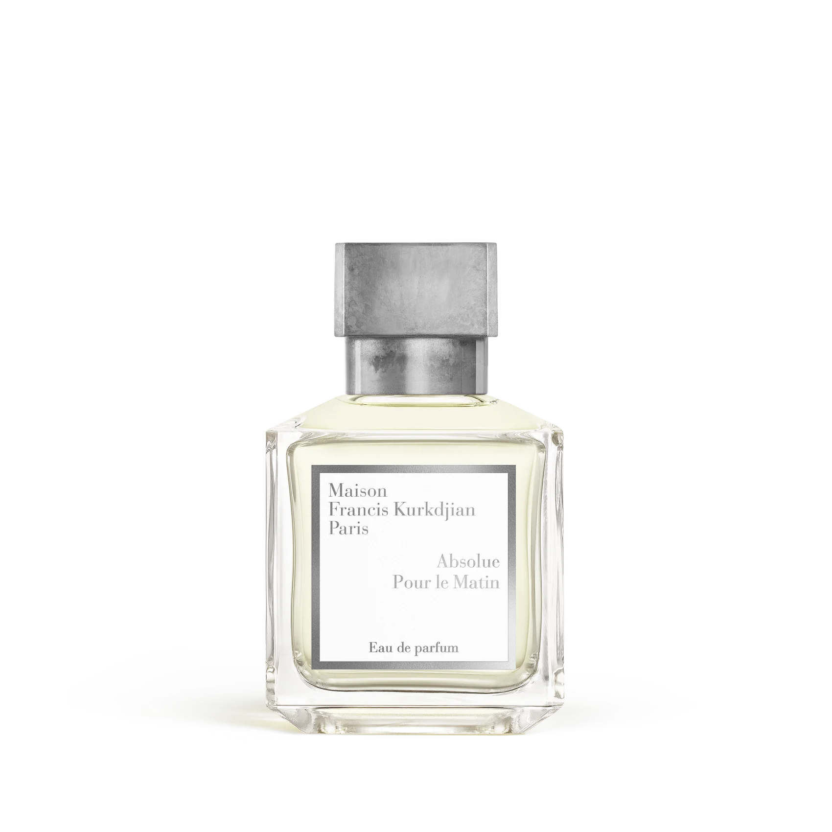 Maison Francis Kurkdjian Absolue Pour le Matin Eau de Parfum in a clear glass bottle with pale yellow liquid and a grey metal