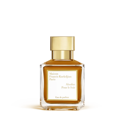 Rectangular clear glass perfume bottle with amber liquid and a shiny gold-toned cap, featuring a white label.