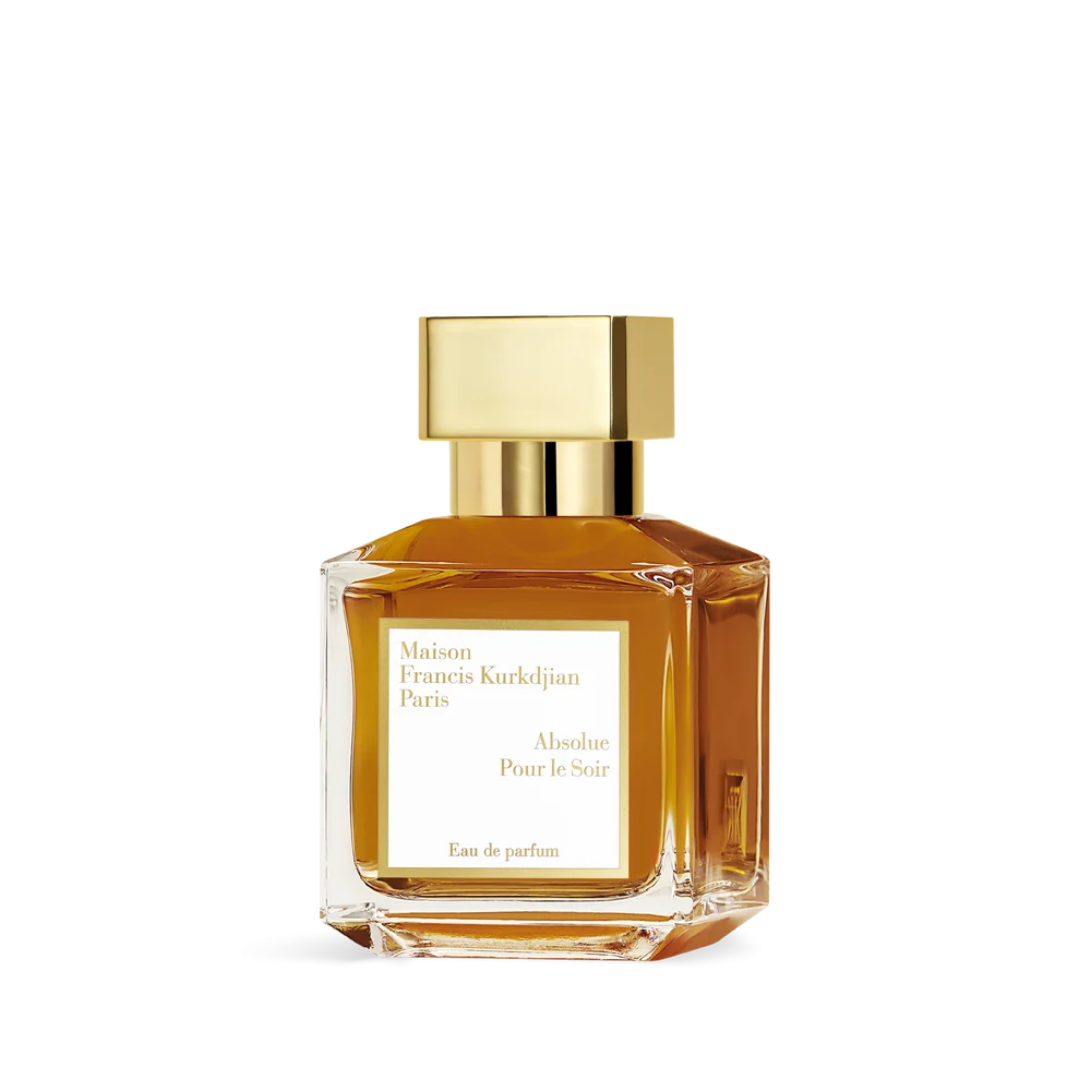 Rectangular glass perfume bottle with amber liquid, a gold-toned rectangular cap, and a white label on the front.