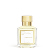 Clear glass perfume bottle with pale yellow liquid and a gold-toned square cap, featuring a white label with black text.