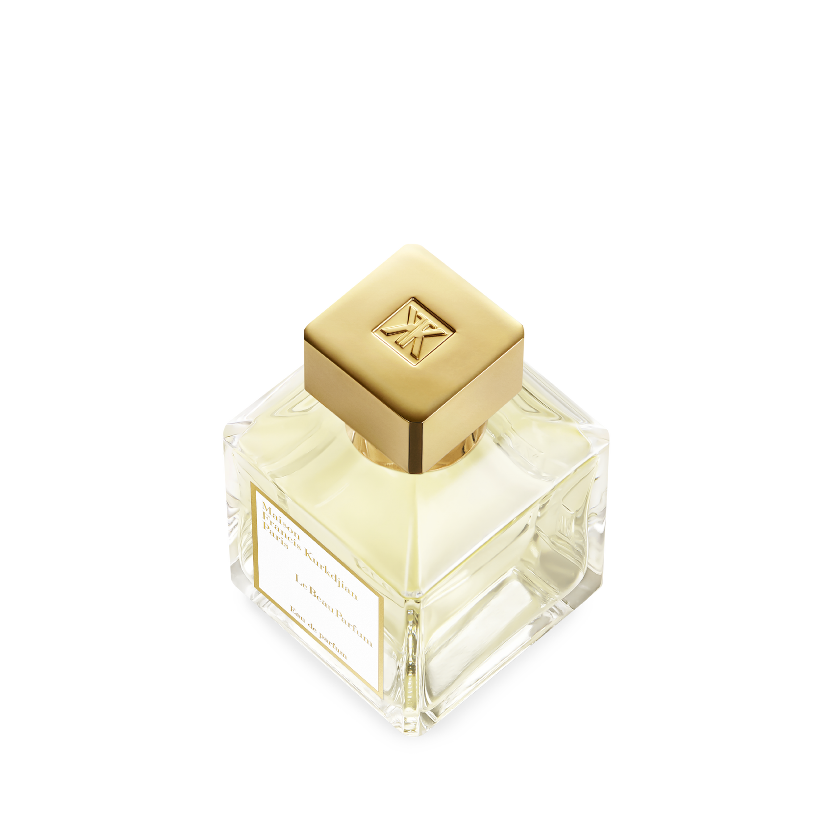 Clear square glass perfume bottle with pale yellow liquid, a gold-toned square cap with an embossed 'FK' logo, and a white la
