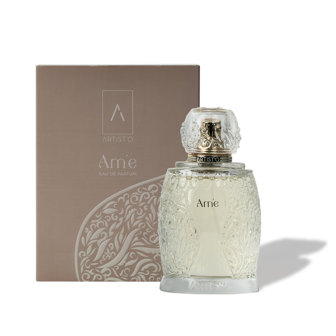Artist’O Ame Eau de Parfum in a decorative clear glass bottle with beige luxury box, showcasing an elegant and timeless fragrance design – Shop Now Online