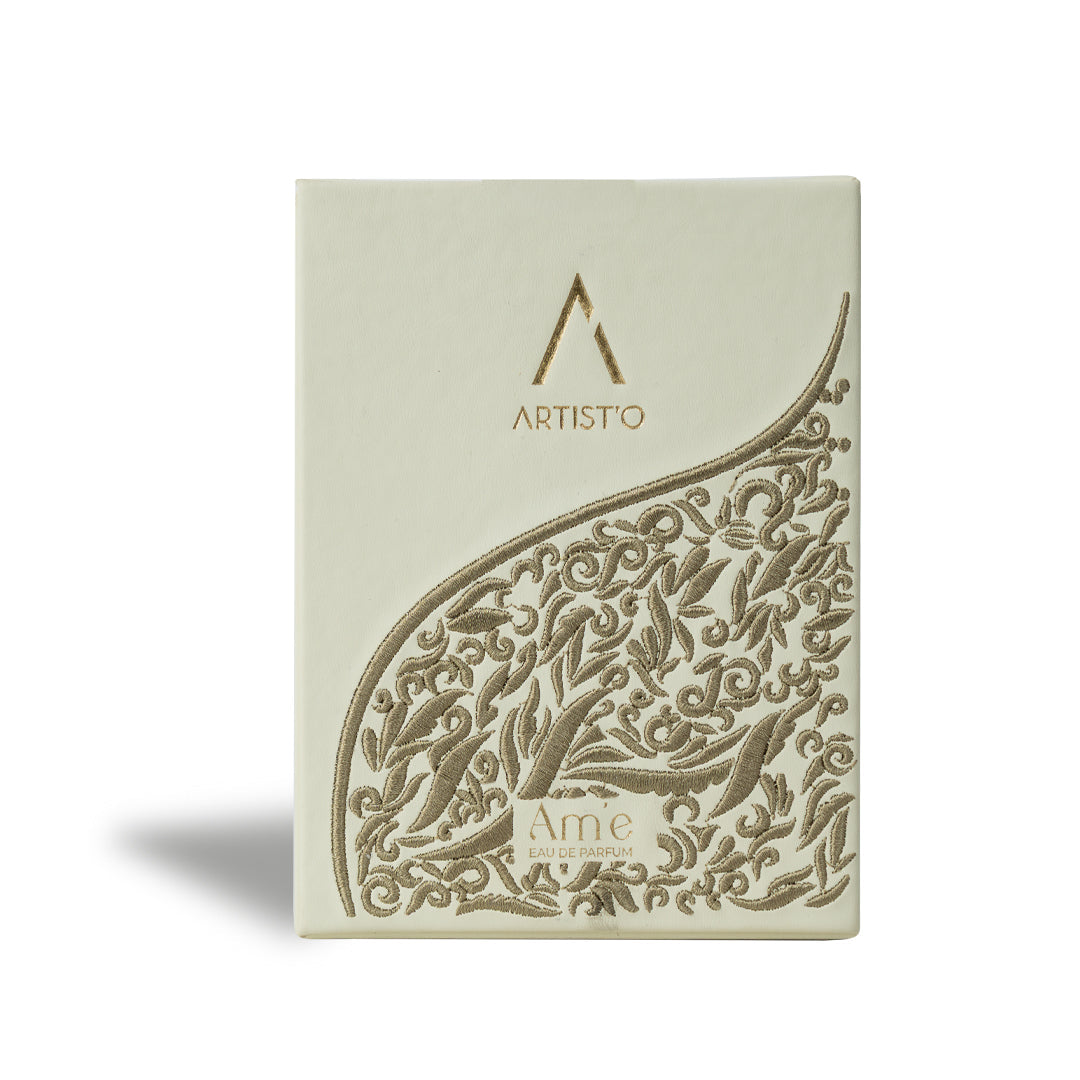 Artist’O Ame Eau de Parfum in a decorative clear glass bottle with beige luxury box, showcasing an elegant and timeless fragrance design – Shop Now Online