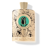 Atkinsons Midnight Scented Dream perfume bottle inside an open luxury gold textured presentation box featuring a descriptive brand story on the inner flap.