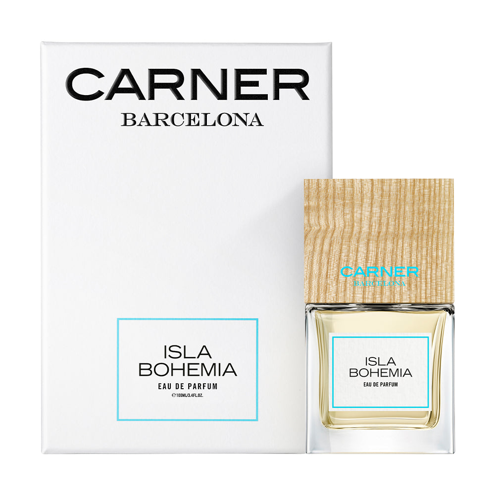 Carner Barcelona Isla Bohemia perfume bottle featuring a heavy clear glass base, a sleek white label with black branding, and a prominent dark square wooden cap.