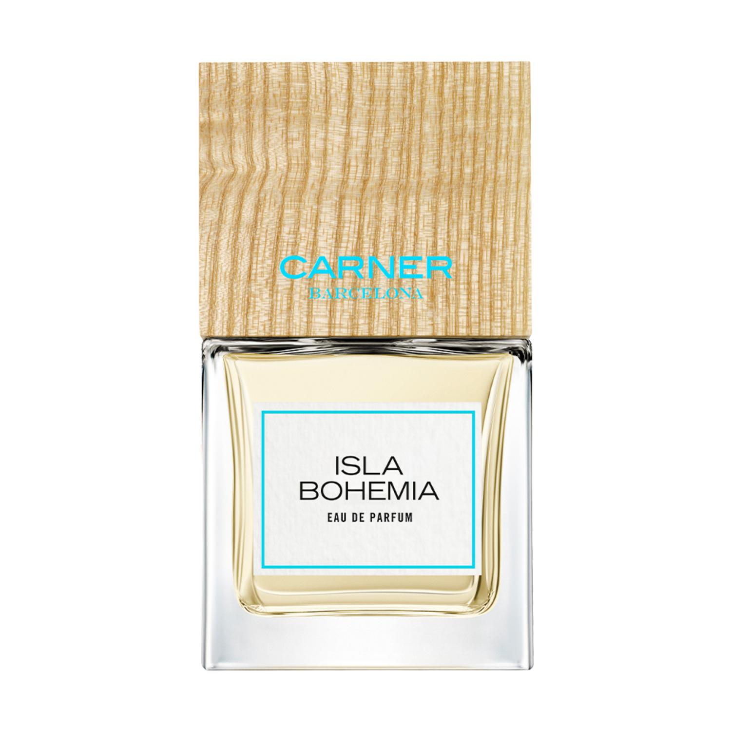 Carner Barcelona Isla Bohemia 100ml perfume bottle topped with its signature square wooden cap, presented next to a clean white retail box featuring minimalist black text.