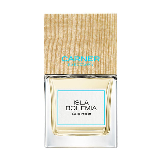 Carner Barcelona Isla Bohemia 100ml perfume bottle topped with its signature square wooden cap, presented next to a clean white retail box featuring minimalist black text.