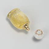 Artist’O Ciel Eau de Parfum in an ornate clear glass bottle with soft blue luxury packaging, showcasing a fresh and elegant fragrance design – Available for Online Purchase