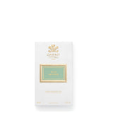 Front view of the white textured outer packaging for Creed Wild Vetiver Eau de Parfum.