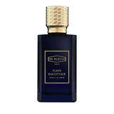 Dark blue rectangular perfume bottle with a gold-toned, textured cap and a gold-bordered label.