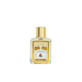 L.T. Piver Cuir de Russie Eau de Parfum 100ml bottle with gold cap displayed beside a yellow vintage-style box featuring a winter illustration and traditional Russian figures, Available for Online Purchase.