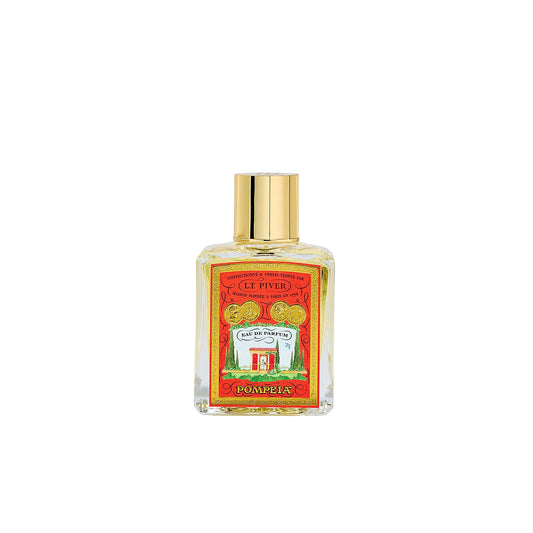 L.T. Piver Pompeia Eau de Parfum 100ml bottle with gold cap displayed beside an orange vintage-style box featuring a garden pavilion illustration and classical scenery, Shop the Latest Online.