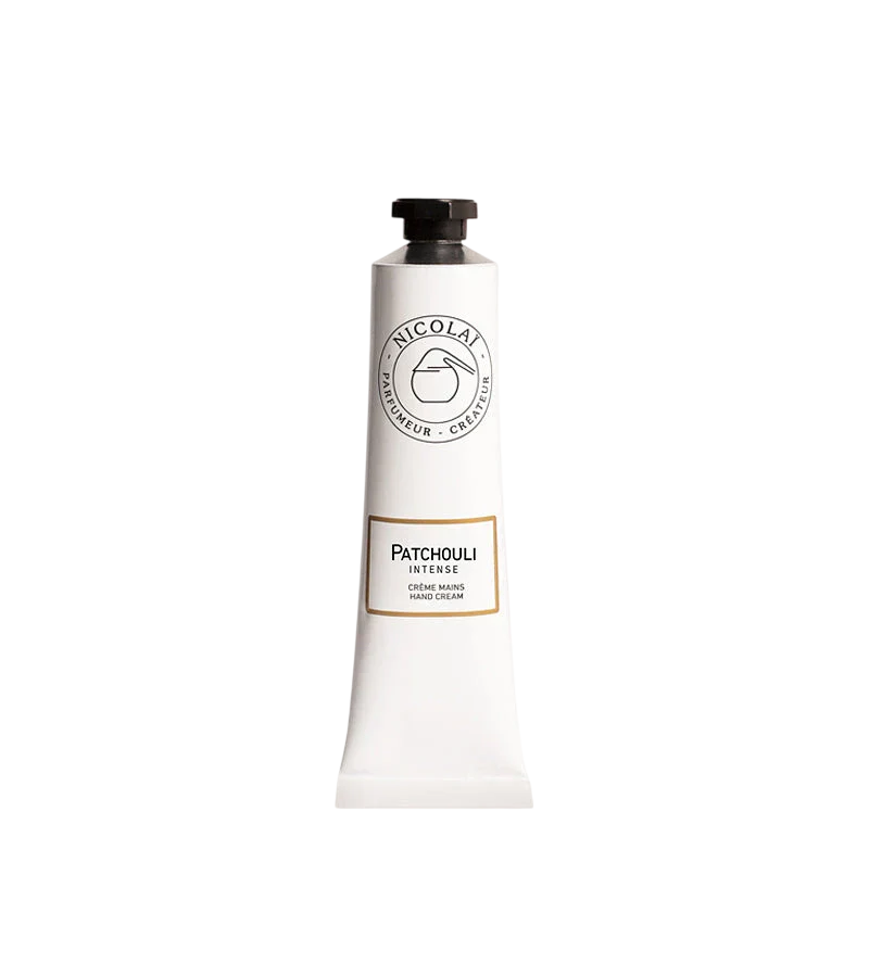 A white squeeze tube of Nicolaï Patchouli Intense Hand Cream featuring a black octagonal cap and the brand's classic circular logo.