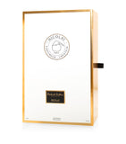 The luxury white and gold-bordered outer packaging for Nicolaï Patchouli Sublime Elixir de Parfum, marked 90ml/3 fl. oz.