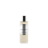 A 100ml clear cylindrical glass bottle of Nicolai Ambre Précieux Home Spray. The bottle features a sleek silver-tone cap and a circular silver label.