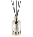 Nicolai Musc Blanc diffuser bottle with black reeds on a white background.