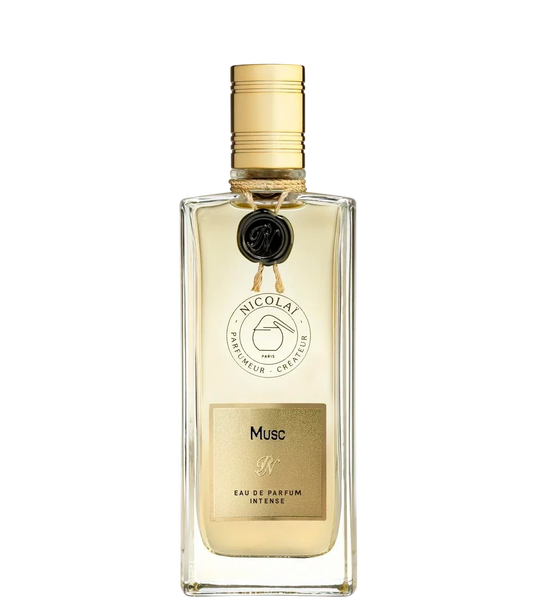 Nicolai elegant glass bottle of Musc fragrance oil featuring a decorative gold cap and labels with traditional patterns.