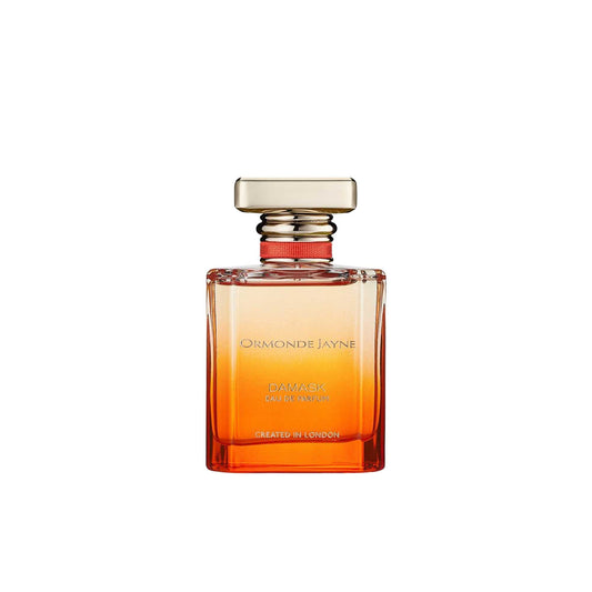 A 50ml bottle of Ormonde Jayne Damask Eau de Parfum featuring an orange gradient glass bottle, a gold rectangular cap with a red ribbon detail, and gold text.