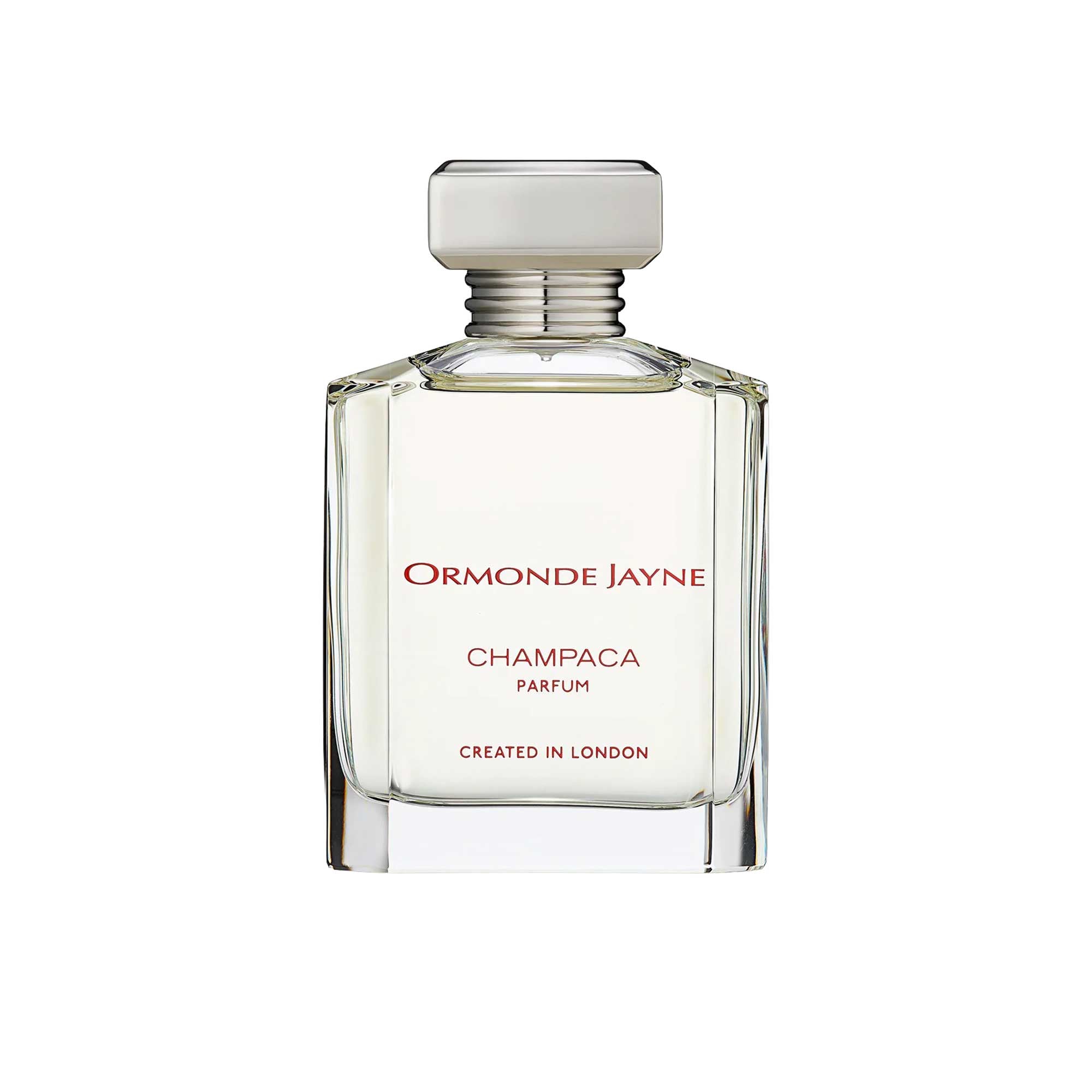 An 88ml bottle of Ormonde Jayne Champaca Parfum. The clear, rectangular glass bottle features red and black text, a silver-toned tiered neck, and a rectangular silver cap.
