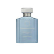 An 88ml opaque light blue glass bottle of Ormonde Jayne Montabaco Cuba, featuring gold lettering and topped with a tiered silver neck and rectangular silver cap.