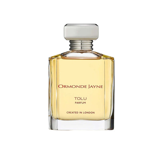 An 88ml clear glass bottle of Ormonde Jayne Tolu Parfum, filled with a warm amber liquid and featuring a tiered silver neck and rectangular silver cap.