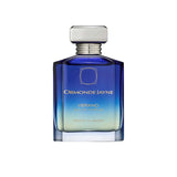 An 88ml translucent azure blue glass bottle of Ormonde Jayne Montabaco Verano, featuring gold lettering and topped with a tiered silver neck and rectangular silver cap.