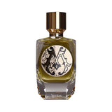 Rectangular glass perfume bottle with faceted base, containing olive-green liquid, a black and cream ornate label, and a gold
