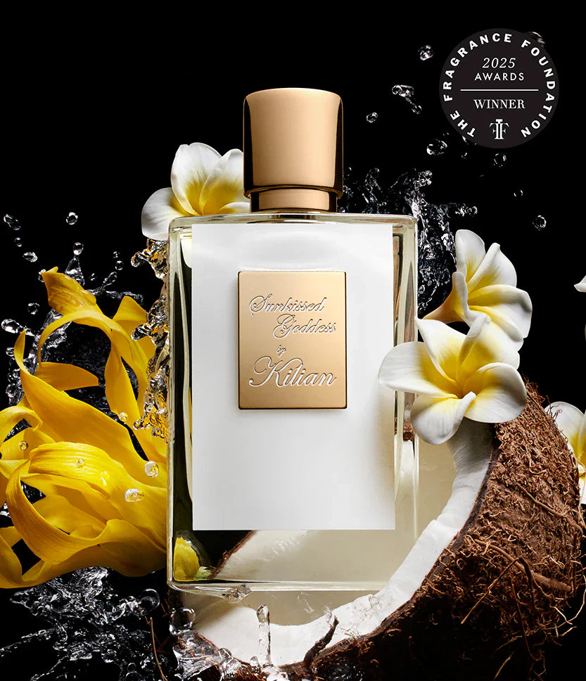 Perfume bottle with flowers and coconut, featuring a 2023 Fragrance Foundation Award winner badge.