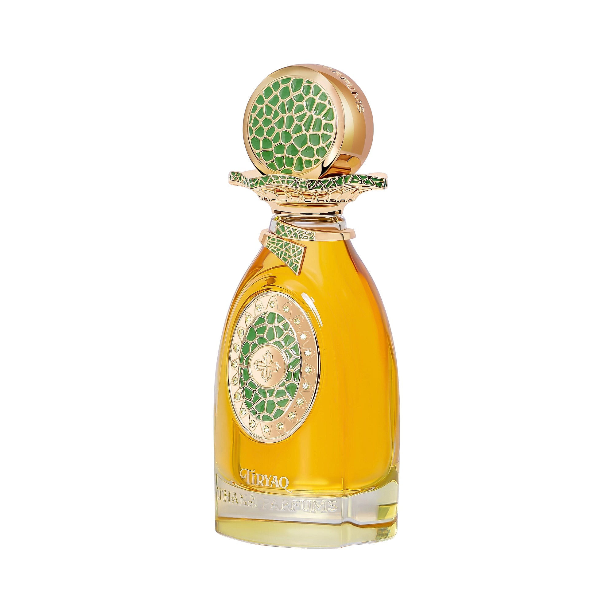 Amber perfume bottle with gold-toned cap and collar featuring green mosaic patterns. Front has a gold-toned circular design w