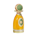 Clear glass bottle with amber perfume. Gold-toned cap and neck have green mosaic. Front features a gold-toned oval with green