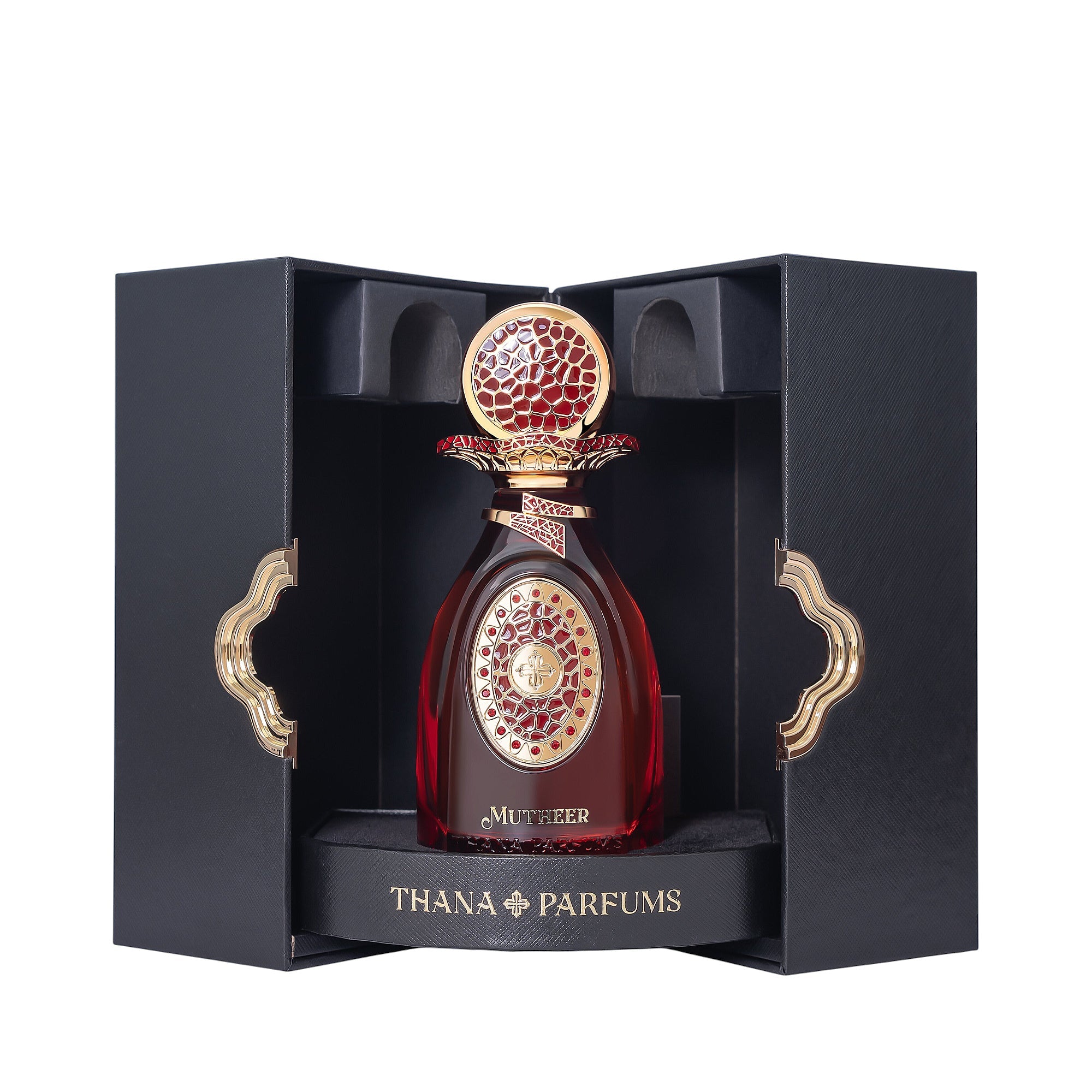 Dark red perfume bottle with an ornate gold-toned cap and label, presented in a black textured box with gold-toned clasps.