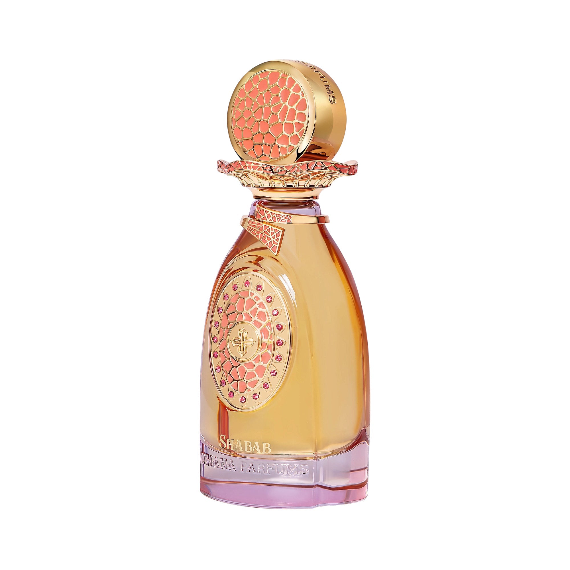 Amber perfume bottle with pink-tinted base, gold-toned cap with coral mosaic top, and a gold-toned emblem with pink gems.