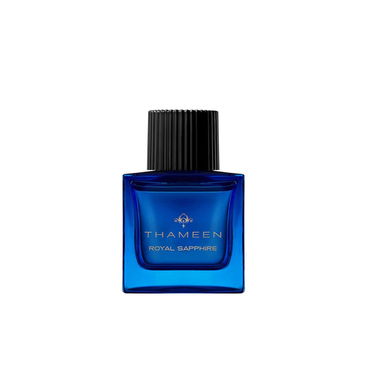 A 50ml square vibrant blue glass bottle of Thameen Royal Sapphire featuring gold lettering and topped with a textured black cylindrical cap.