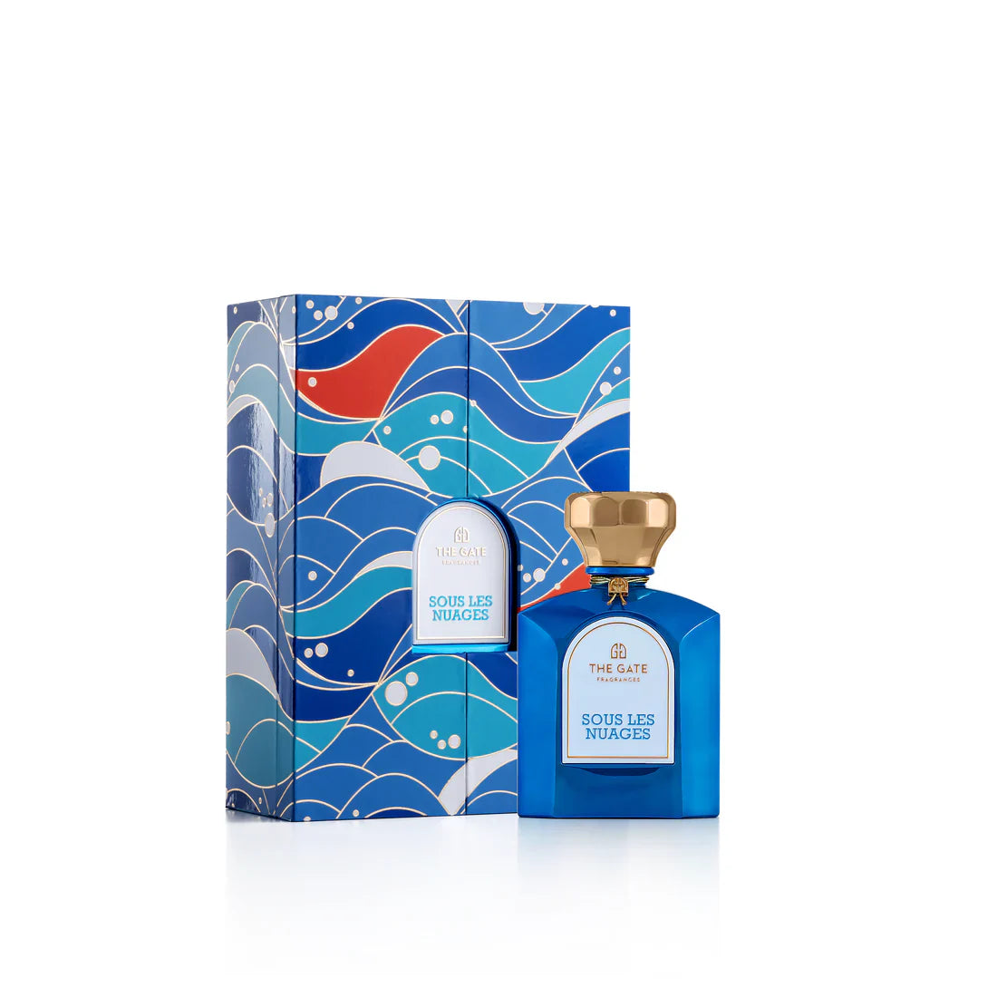 The Gate Fragrances Sous Les Nuages Extrait de Parfum blue bottle with gold cap displayed beside its patterned presentation box.